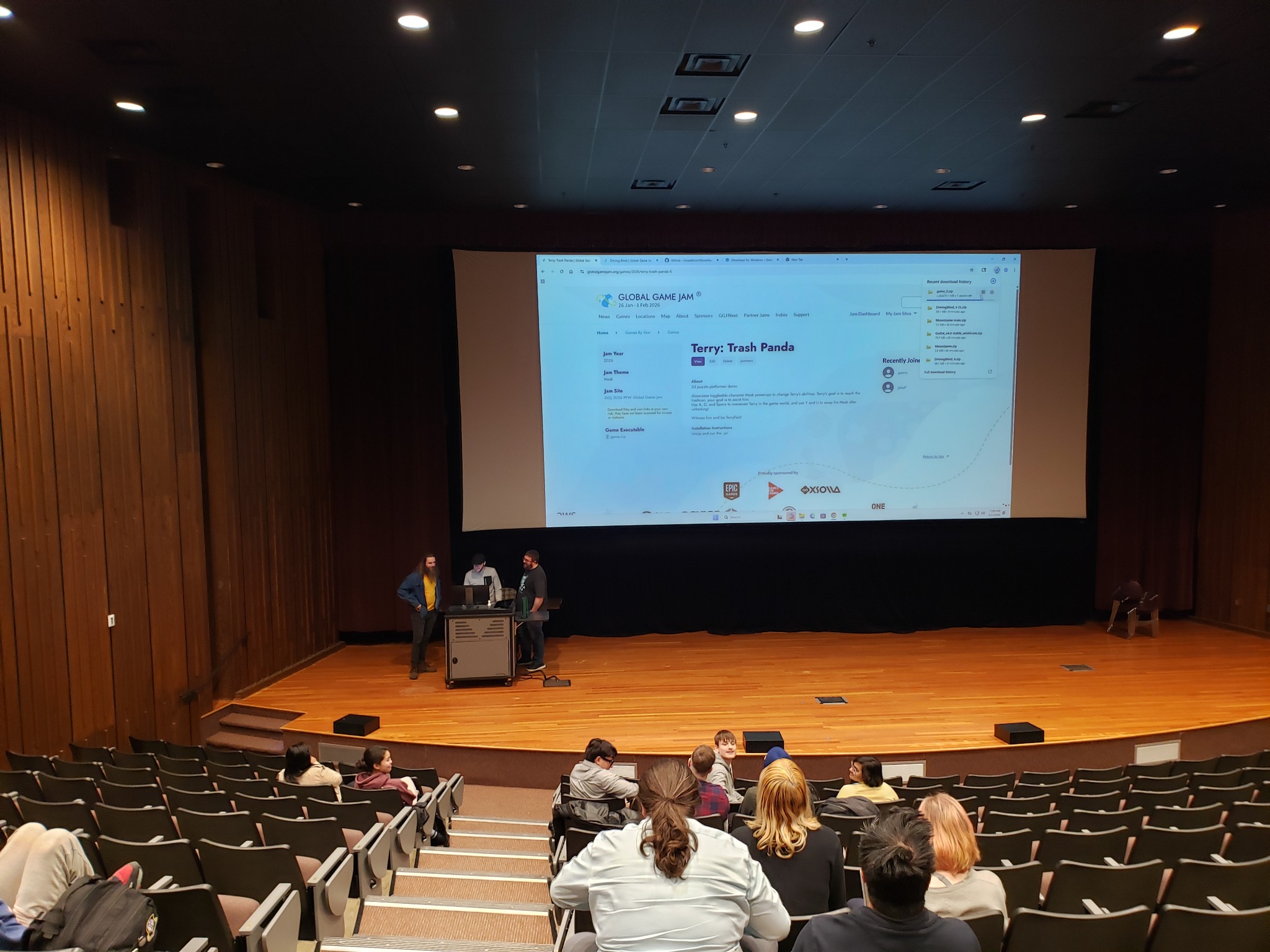 PFW ACM students presenting a Global Game Jam project in an auditorium